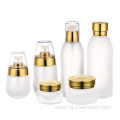 wholesales High-grade golden carved ABS cap transparent glass cosmetic bottles/jars with good price